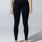 The Seamless Legging in black, high-rise waistband and full-length leg, front view