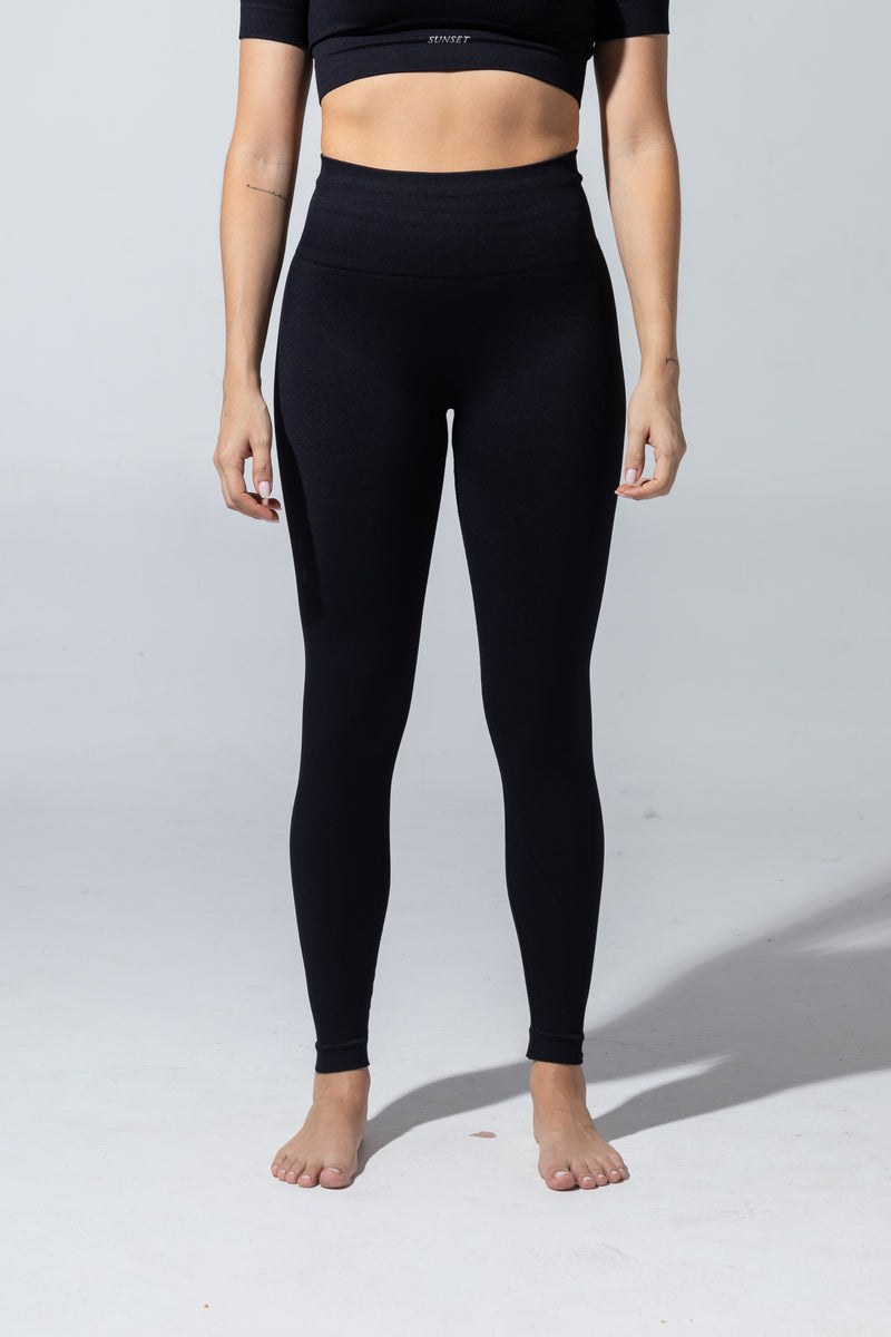 The Seamless Legging in black, high-rise waistband and full-length leg, front view