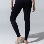 The Seamless Legging in black, back view